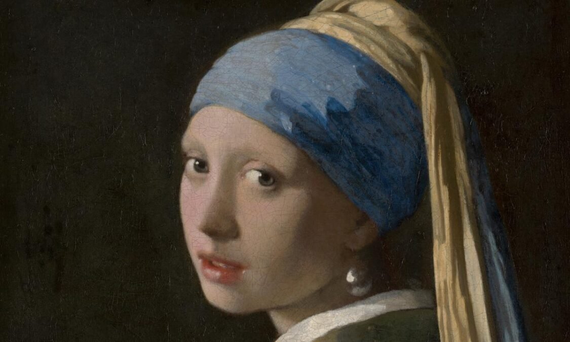 The Most Beautiful Artworks That Inspire the World 4 The Girl with a Pearl Earring painting by Johannes Vermeer showing a young woman in a blue and gold headscarf