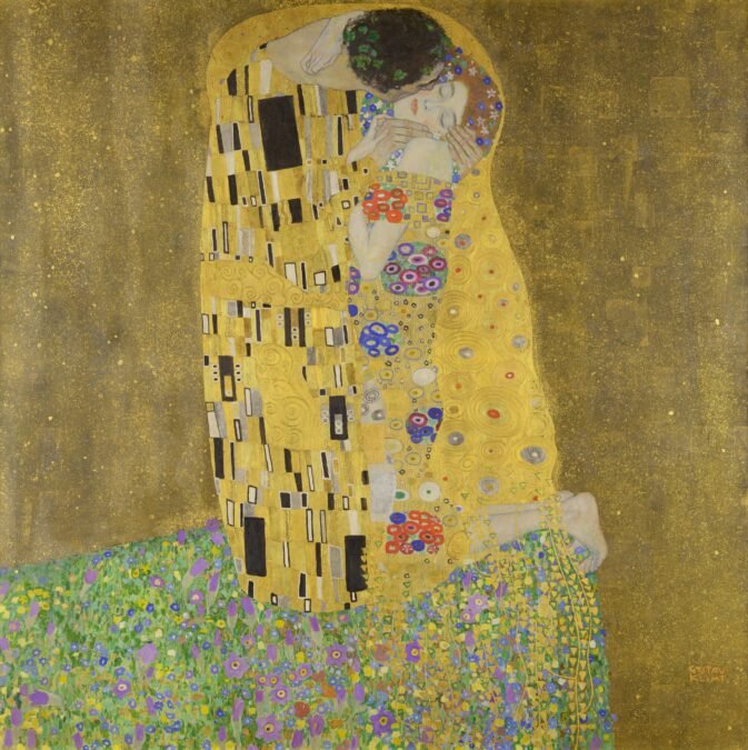 The Most Beautiful Artworks That Inspire the World 9 The Kiss by Gustav Klimt, famous painting featuring a couple surrounded by golden patterns